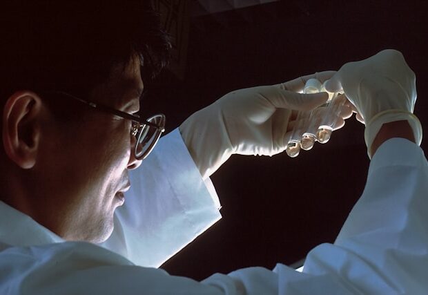 scientist testing types of assay